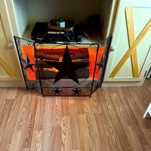 Image fire place with rotating “flames” to look authentic.